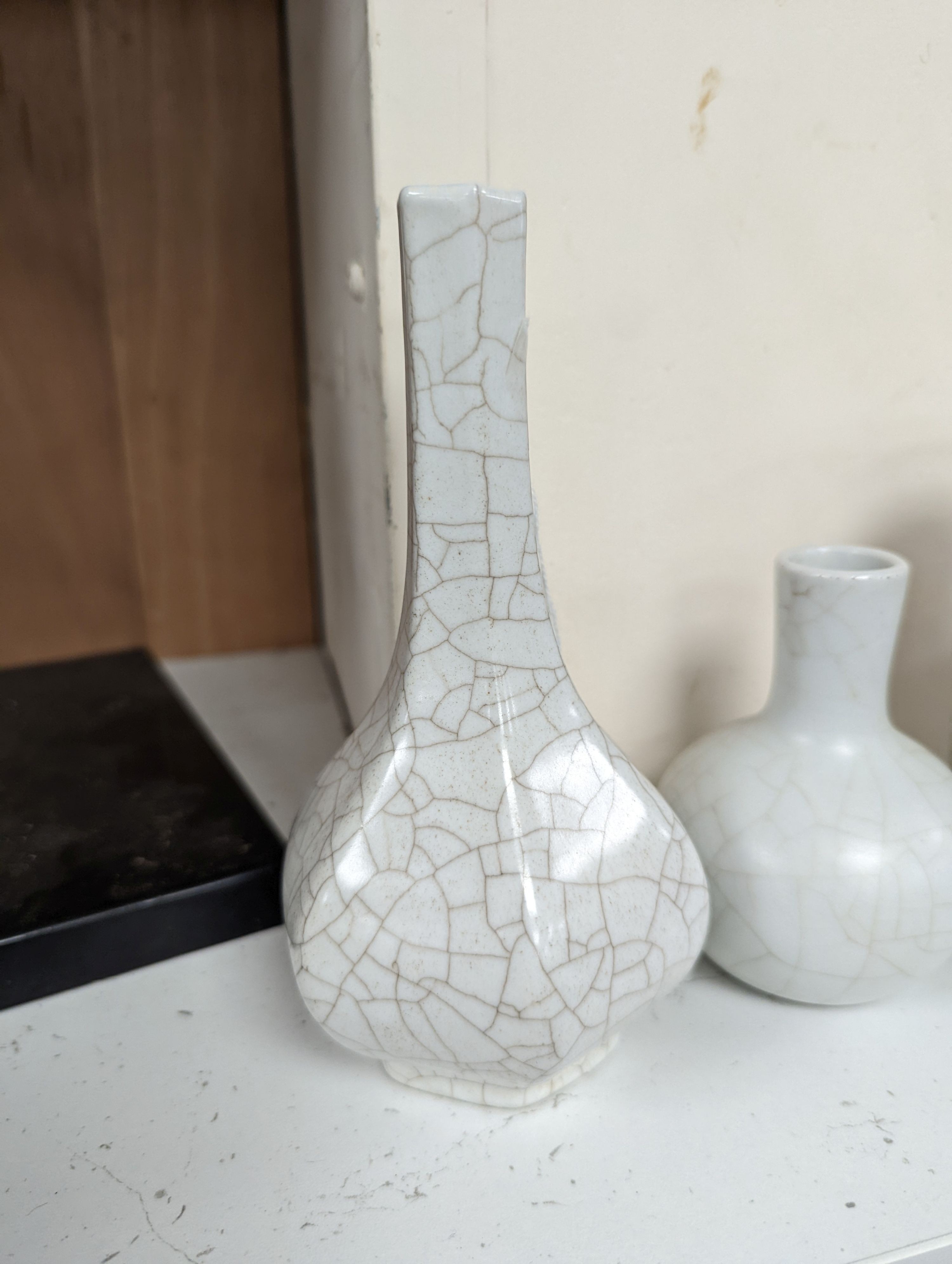 Four Chinese crackle glaze vases, tallest 16 cms high.